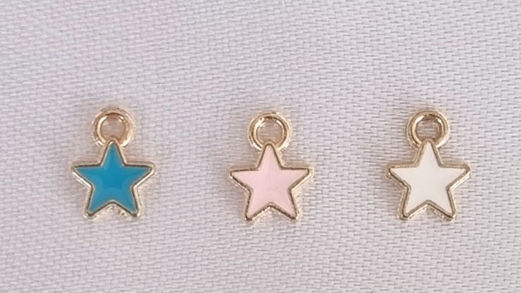 Gold plated mini star charm, front side