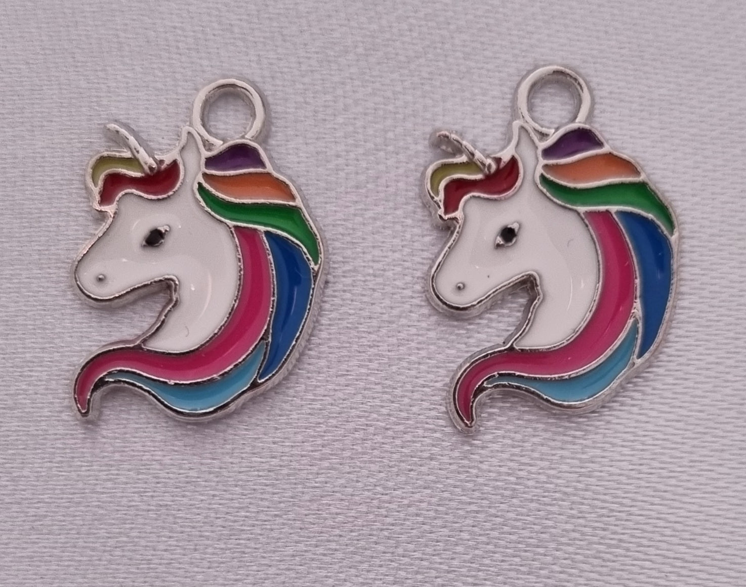 Silver plated unicorn enamel charm, front side