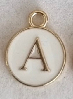 Gold plated double-sided white enamel letter charm, front side