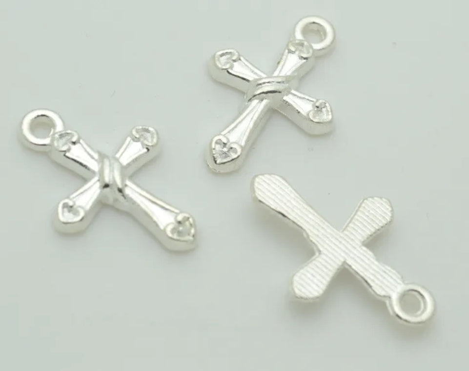 Silver plated cross charm, front side